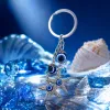 Silver keychain pendant, blue Devil's Eye starfish pendant Specification image